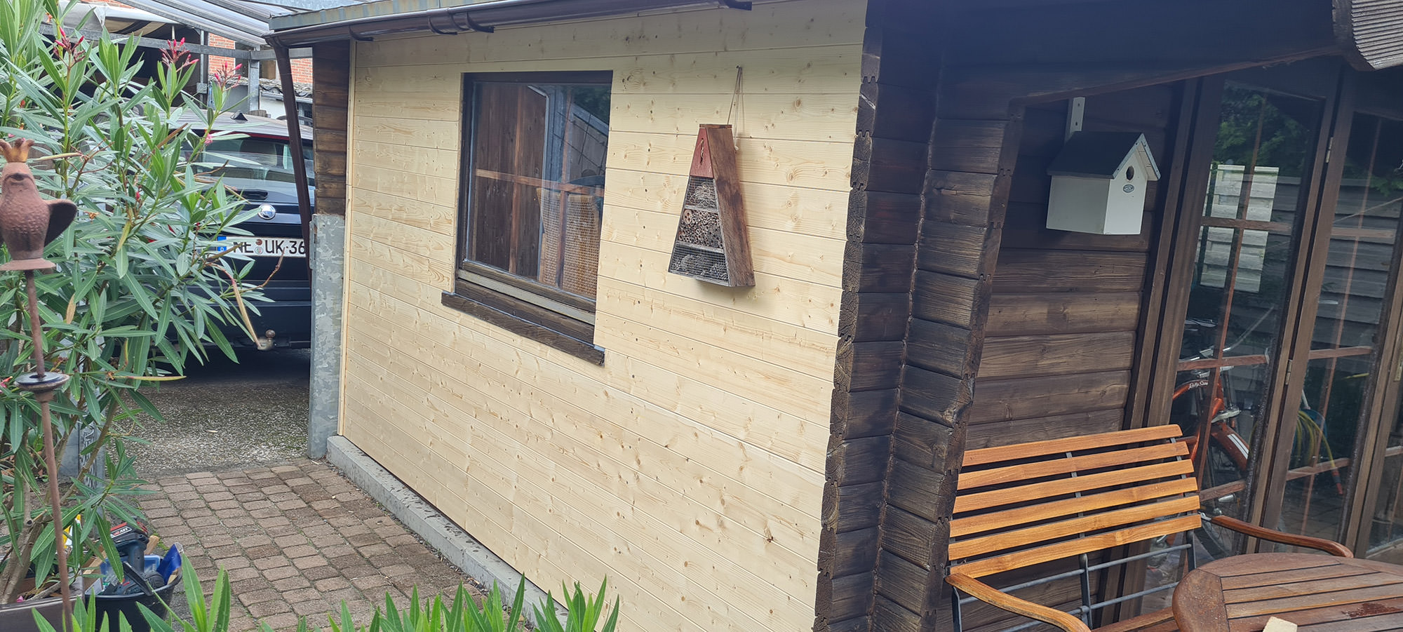 Fassade mit Neueindeckung aus Profilholz